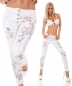 Preview: Sommerliche Röhrenhose mit bunten Prints und Metallic-Effekten in weiß