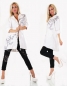 Preview: Lässige Italy Sweatjacke im Vintage-Look mit hübschen Flower-Prints in weiß