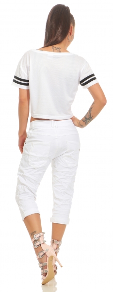 Capri-Jeans mit diagonaler Knopfleiste in weiß