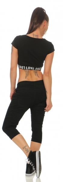 Capri-Jeans mit aufgesetzter Knopfleiste in schwarz